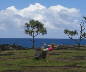Photo of Rena doing yoga in Hawaii